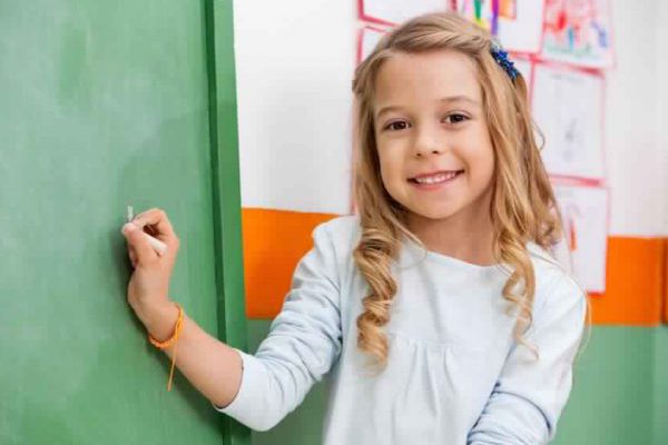 one4all-cute-girl-writing-on-board-in-kindergarte one4all